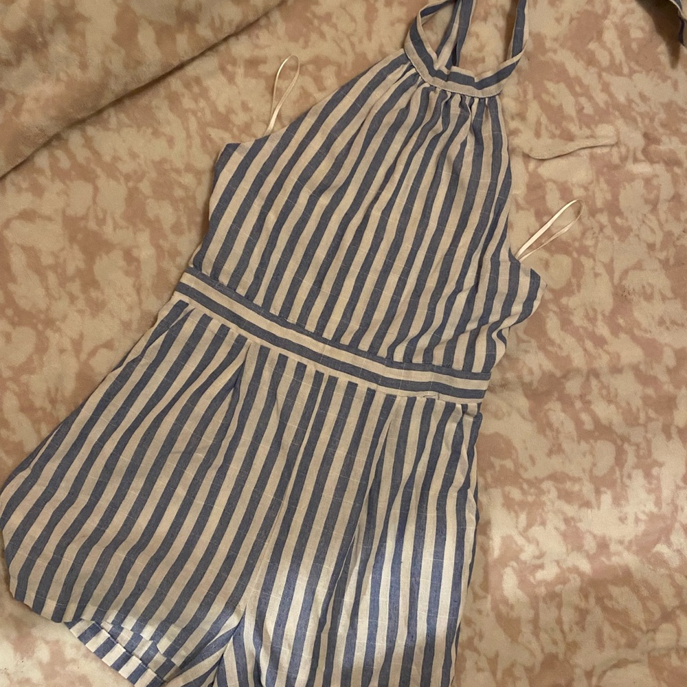 This is a romper super cute and open from the back
